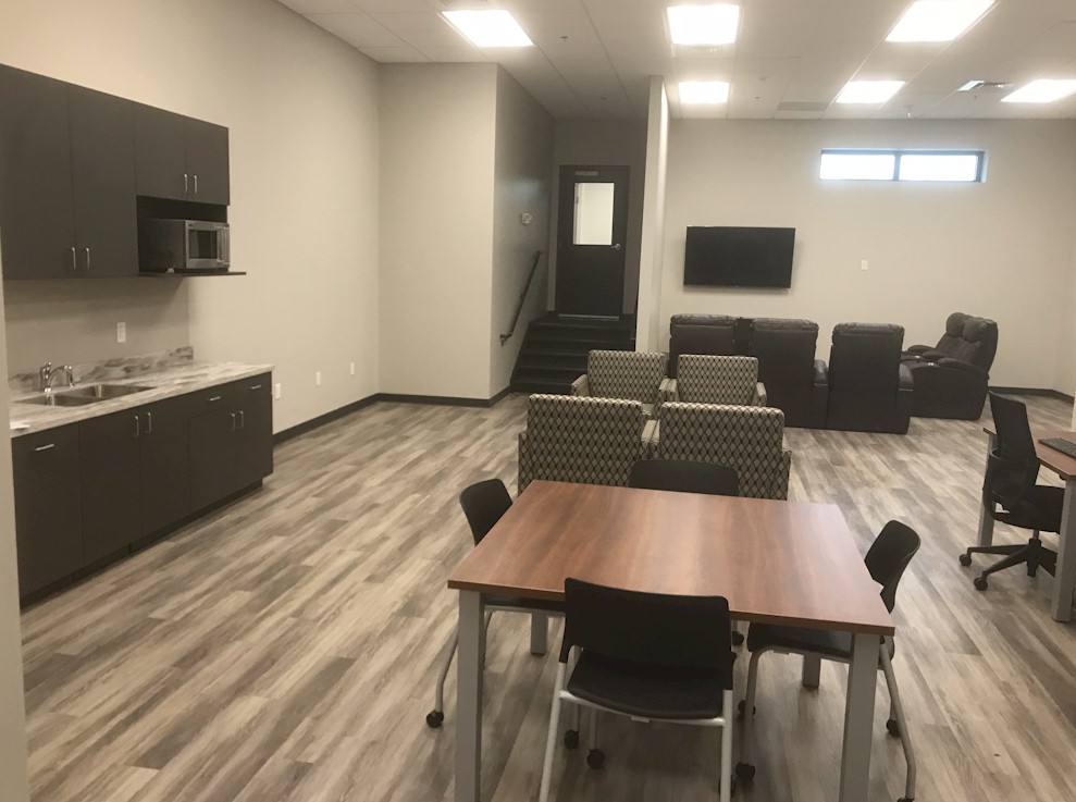 Barr-Nunn Charlotte, NC truck terminal building showing driver lounge tables, chairs, and kitchenette