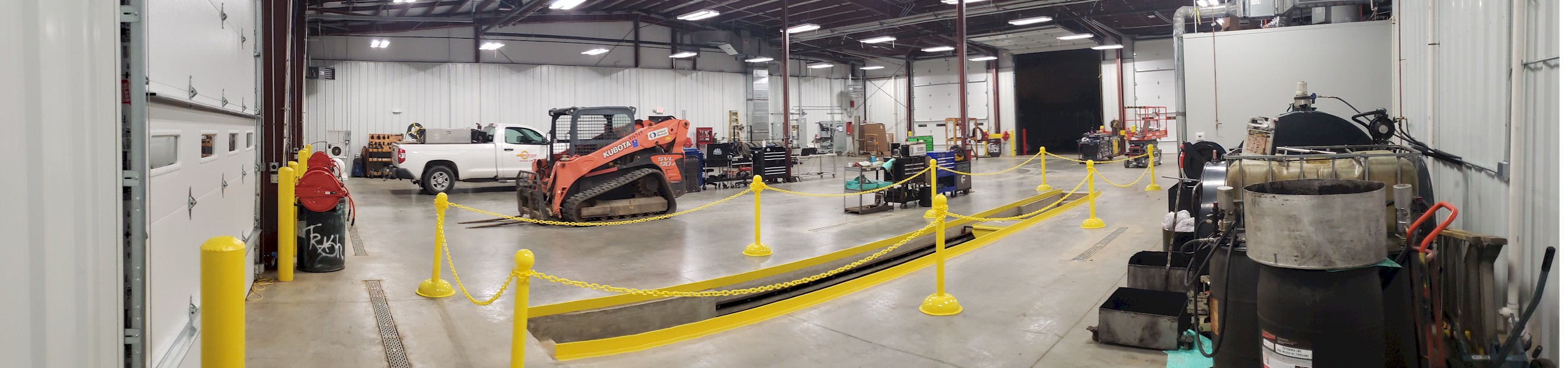 Barr-Nunn Charlotte, NC truck terminal building showing service bays and company forklift