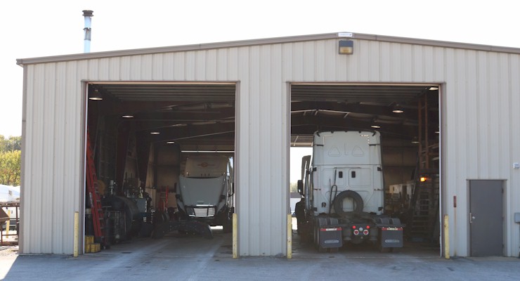 Barr-Nunn Manchester, PA truck terminal building exterior showing vehicles in maintenance and service bays