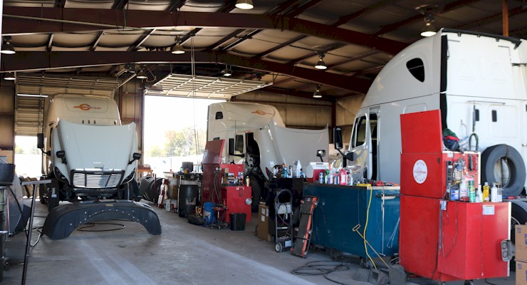 Barr-Nunn Manchester, PA truck terminal building interior showing vehicles in maintenance and service bays